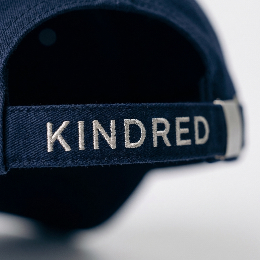 KINDRED embroidery on the back strap