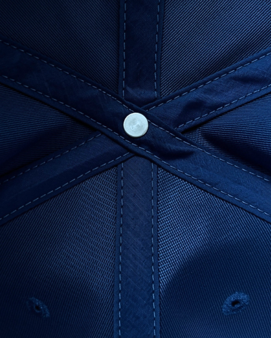 Macro close-up of the interior crown seams and knit lining